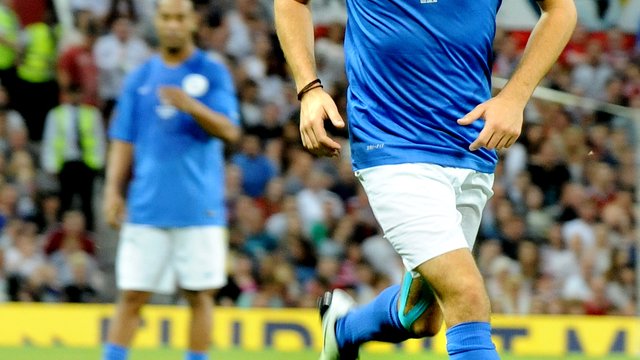 Niall Horan playing football with SoccerAid