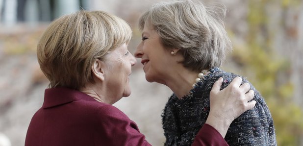Theresa May Angela Merkel Kiss