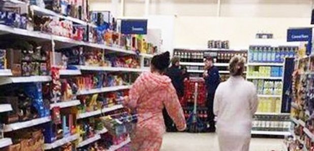 Women In PJs In Supermarket