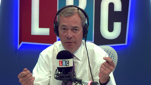 Nigel Farage listening