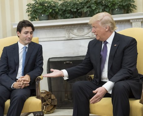 Donald Trump offers Justin Trudeau a handshake, the Canadian PM looks less than impressed